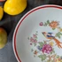 Zsolnay falitányér paradicsommadaras dekorral